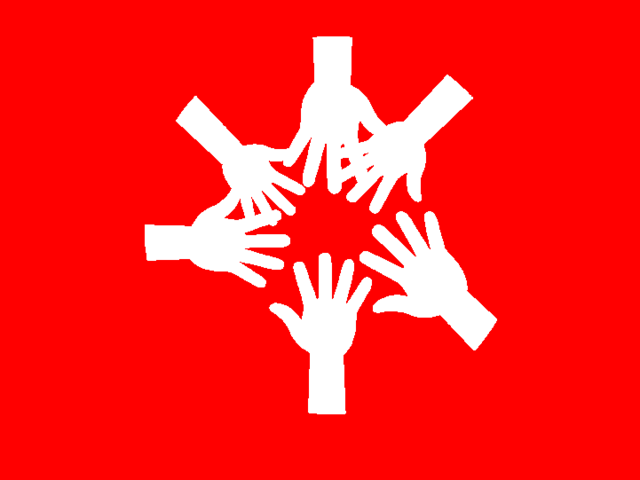 Mehrere Hände zeigen gemeinsam in die Mitte