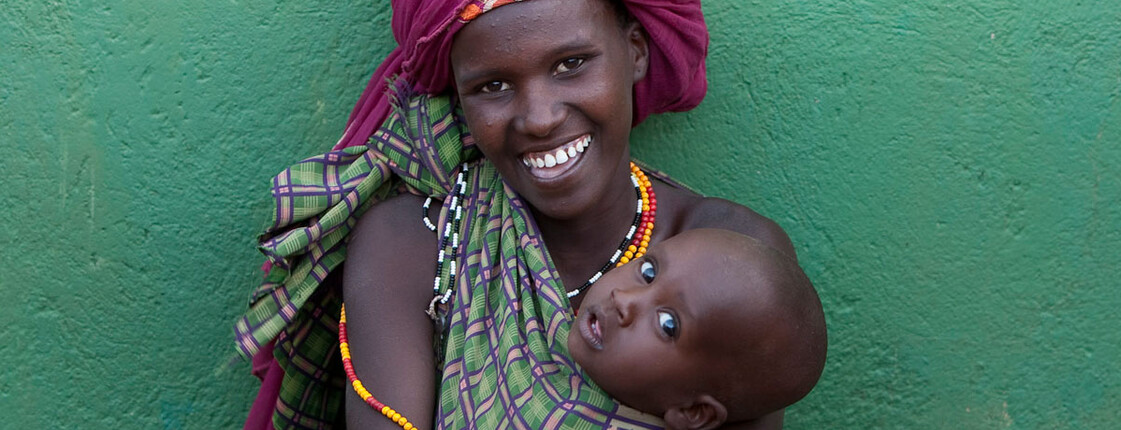 Frau mit Getreide und Baby